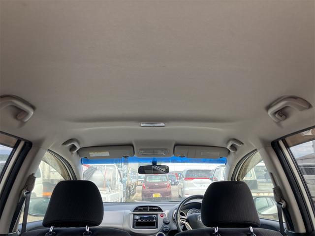 フィットハイブリッド スマートセレクション ハイブリッド オートクルーズコントロール オートライト HID スマートキー 電動格納ミラー CVT レンタカーアップ 盗難防止システム 衝突安全ボディ CD USB ABS エアコン(34枚目)