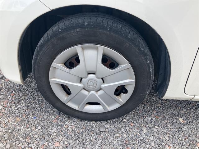 フィットハイブリッド スマートセレクション ハイブリッド オートクルーズコントロール オートライト HID スマートキー 電動格納ミラー CVT レンタカーアップ 盗難防止システム 衝突安全ボディ CD USB ABS エアコン(35枚目)