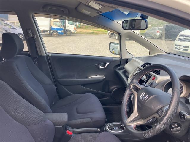 フィットハイブリッド スマートセレクション ハイブリッド オートクルーズコントロール オートライト HID スマートキー 電動格納ミラー CVT レンタカーアップ 盗難防止システム 衝突安全ボディ CD USB ABS エアコン(55枚目)