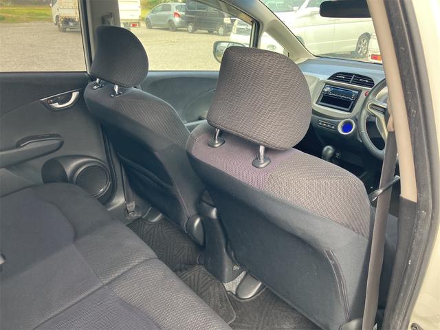 フィットハイブリッド スマートセレクション ハイブリッド オートクルーズコントロール オートライト HID スマートキー 電動格納ミラー CVT レンタカーアップ 盗難防止システム 衝突安全ボディ CD USB ABS エアコン(60枚目)