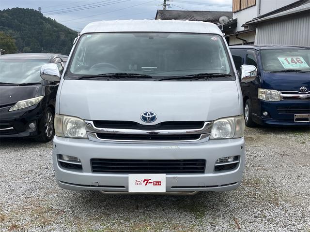 ハイエースワゴン ETC バックカメラ 10人乗り ナビ TV クリアランスソナー 電動スライドドア キーレスエントリー 電動格納ミラー 後席モニター AT CD DVD再生 100V電源 エアコン パワーステアリング(12枚目)