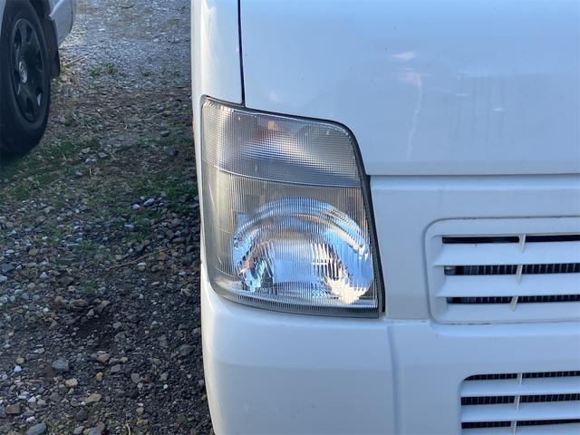 キャリイトラック 4WD 軽トラック パワステ 5速マニュアル ヘッドライトレベライザー エアコン 三方開 積載量350kg(4枚目)