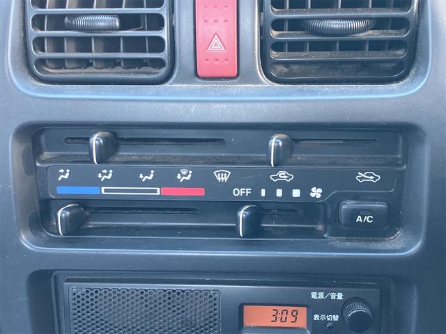 キャリイトラック 4WD 軽トラック パワステ 5速マニュアル ヘッドライトレベライザー エアコン 三方開 積載量350kg(34枚目)