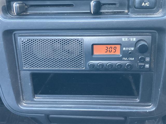 キャリイトラック 4WD 軽トラック パワステ 5速マニュアル ヘッドライトレベライザー エアコン 三方開 積載量350kg(35枚目)