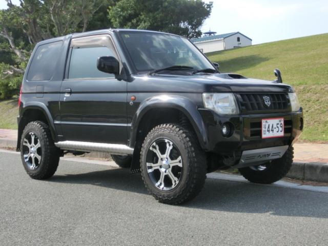 キックス RX 4WD ターボ 5MT リフトアップ公認 マッドタイヤ MKWアルミホイール オーバーフェンダー JAOSアンダーガード JAOSマッドフラップ 社外マフラー (ブラック)(2枚目)