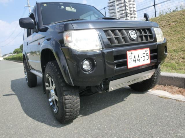キックス RX 4WD ターボ 5MT リフトアップ公認 マッドタイヤ MKWアルミホイール オーバーフェンダー JAOSアンダーガード JAOSマッドフラップ 社外マフラー (ブラック)(34枚目)