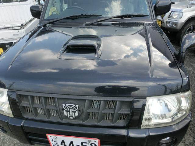 キックス RX 4WD ターボ 5MT リフトアップ公認 マッドタイヤ MKWアルミホイール オーバーフェンダー JAOSアンダーガード JAOSマッドフラップ 社外マフラー (ブラック)(64枚目)