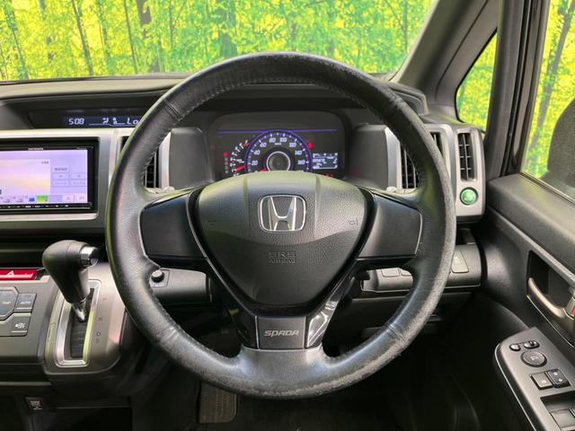 ステップワゴンスパーダ Ｚ　フリップダウンモニター　両側電動スライド　禁煙車　ＳＤナビ　バックカメラ　ＥＴＣ　Ｂｌｕｅｔｏｏｔｈ　フルセグ　ドライブレコーダー　オートライト　オートエアコン　ＨＩＤヘッド　革巻きステアリング（11枚目）