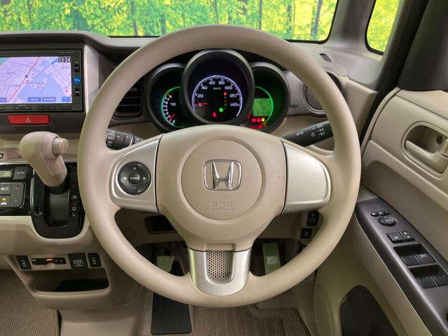 Ｎ－ＢＯＸ Ｇ　ＳＳパッケージ　電動スライドドア　禁煙車　純正ＳＤナビ　バックカメラ　ＥＴＣ　フルセグ　スマートキー　シートヒーター　ステアリングスイッチ　オートエアコン　ＣＤ／ＤＶＤ再生　盗難防止装置　プライバシーガラス（12枚目）