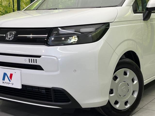 フリード エアー 登録済未使用車 両側電動スライドドア バックカメラ 衝突軽減装置 レーダークルーズ コーナーセンサー レーンキープ スマートキー LEDヘッド ディスプレイオーディオ オートマチックハイビーム(13枚目)