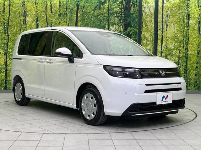 フリード エアー 登録済未使用車 両側電動スライドドア バックカメラ 衝突軽減装置 レーダークルーズ コーナーセンサー レーンキープ スマートキー LEDヘッド ディスプレイオーディオ オートマチックハイビーム(17枚目)