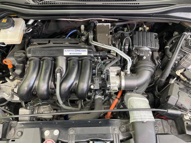 ヴェゼル ハイブリッドＲＳ・ホンダセンシング　純正ナビ　衝突軽減装置　バックカメラ　レーダークルーズ　ハーフレザーシート　コーナーセンサー　ＥＴＣ　レーンキープ　スマートキー　シートヒーター　ドライブレコーダー　ＬＥＤヘッド　　車線逸脱警報（18枚目）