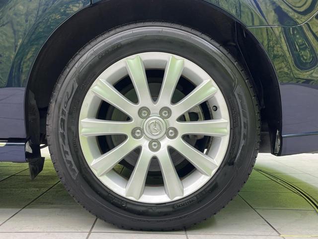 MPV 23S 両側電動スライドドア 禁煙車 純正ナビ ETC バックカメラ スマートキー HIDヘッドライト 革巻きステアリング ステアリングスイッチ オートエアコン 純正17インチアルミホイール オットマン(23枚目)