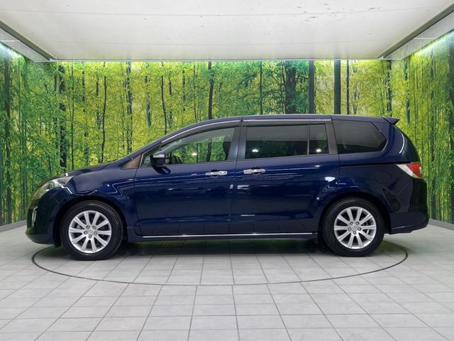 MPV 23S 両側電動スライドドア 禁煙車 純正ナビ ETC バックカメラ スマートキー HIDヘッドライト 革巻きステアリング ステアリングスイッチ オートエアコン 純正17インチアルミホイール オットマン(26枚目)