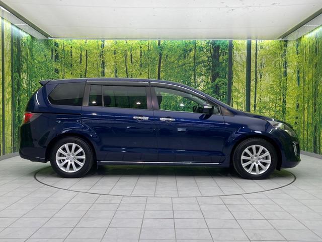 MPV 23S 両側電動スライドドア 禁煙車 純正ナビ ETC バックカメラ スマートキー HIDヘッドライト 革巻きステアリング ステアリングスイッチ オートエアコン 純正17インチアルミホイール オットマン(35枚目)