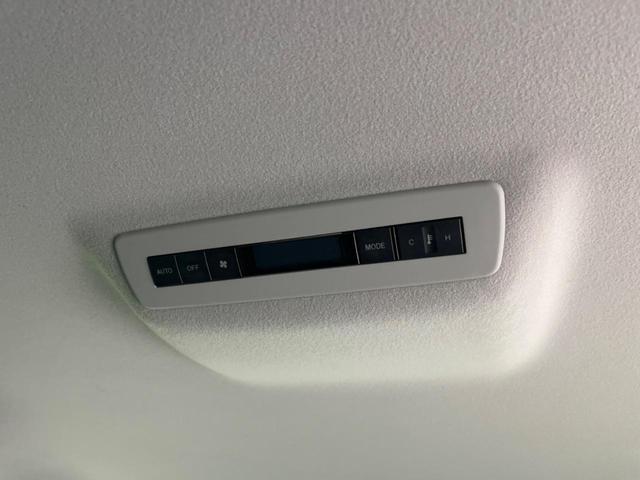 MPV 23S 両側電動スライドドア 禁煙車 純正ナビ ETC バックカメラ スマートキー HIDヘッドライト 革巻きステアリング ステアリングスイッチ オートエアコン 純正17インチアルミホイール オットマン(39枚目)