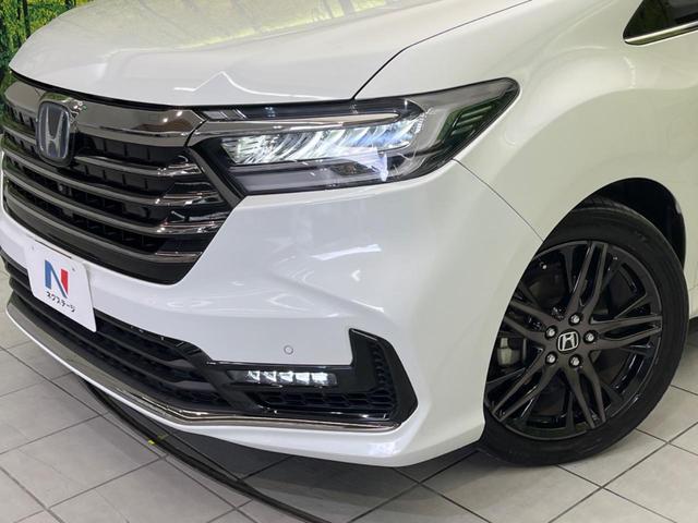 オデッセイハイブリッド e:HEVアブソルート・EX 後席モニター 両側電動スライドドア 衝突被害軽減装置 禁煙車 純正ナビ 全周囲カメラ レーダークルーズ ETC Bluetooth フルセグ ハーフレザーシート LEDヘッドライト LEDフォグライト(12枚目)