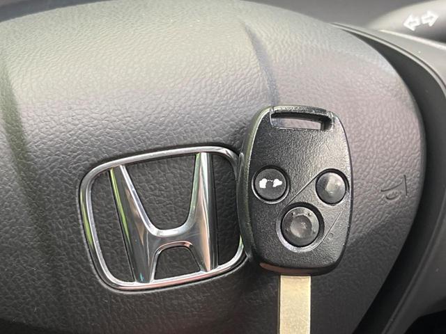 フリード G ハイウェイエディション 電動スライドドア 純正SDナビ バックカメラ 禁煙車 ETC HIDヘッドライト CD/DVD再生 オートライト キーレス 電動格納ミラー(7枚目)