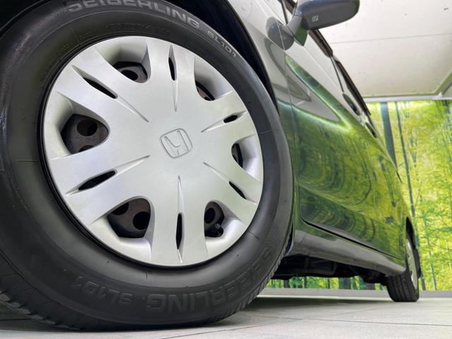 フリード G ハイウェイエディション 電動スライドドア 純正SDナビ バックカメラ 禁煙車 ETC HIDヘッドライト CD/DVD再生 オートライト キーレス 電動格納ミラー(14枚目)