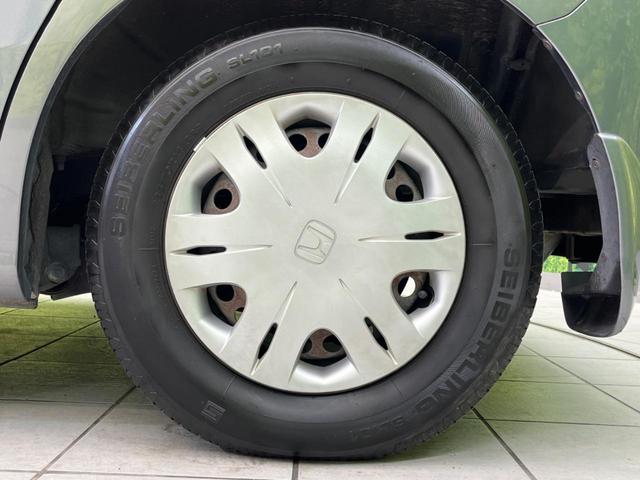 フリード G ハイウェイエディション 電動スライドドア 純正SDナビ バックカメラ 禁煙車 ETC HIDヘッドライト CD/DVD再生 オートライト キーレス 電動格納ミラー(23枚目)