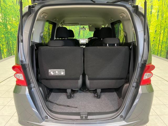 フリード G ハイウェイエディション 電動スライドドア 純正SDナビ バックカメラ 禁煙車 ETC HIDヘッドライト CD/DVD再生 オートライト キーレス 電動格納ミラー(24枚目)