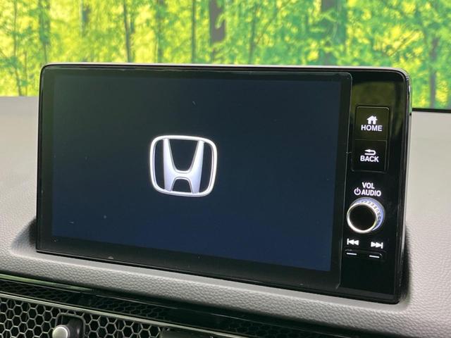 シビック ｅ：ＨＥＶ　衝突軽減装置　禁煙車　純正９インチナビ　ＢＯＳＥサウンド　アダプティブクルーズ　バックカメラ　ＥＴＣ　Ｂｌｕｅｔｏｏｔｈ　フルセグ　ドライブレコーダー　シートヒーター　パワーシート（4枚目）