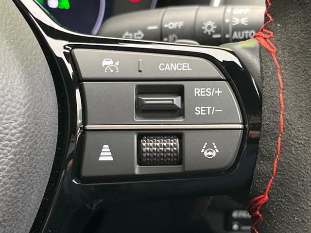 シビック ｅ：ＨＥＶ　衝突軽減装置　禁煙車　純正９インチナビ　ＢＯＳＥサウンド　アダプティブクルーズ　バックカメラ　ＥＴＣ　Ｂｌｕｅｔｏｏｔｈ　フルセグ　ドライブレコーダー　シートヒーター　パワーシート（6枚目）