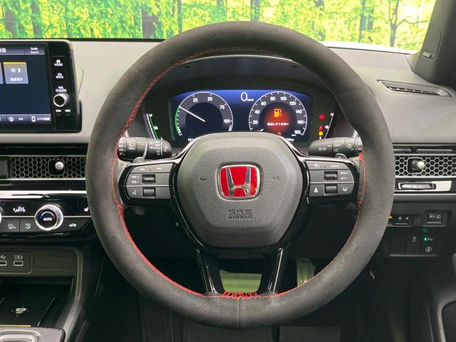 シビック ｅ：ＨＥＶ　衝突軽減装置　禁煙車　純正９インチナビ　ＢＯＳＥサウンド　アダプティブクルーズ　バックカメラ　ＥＴＣ　Ｂｌｕｅｔｏｏｔｈ　フルセグ　ドライブレコーダー　シートヒーター　パワーシート（11枚目）