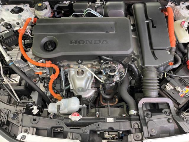 シビック ｅ：ＨＥＶ　衝突軽減装置　禁煙車　純正９インチナビ　ＢＯＳＥサウンド　アダプティブクルーズ　バックカメラ　ＥＴＣ　Ｂｌｕｅｔｏｏｔｈ　フルセグ　ドライブレコーダー　シートヒーター　パワーシート（18枚目）