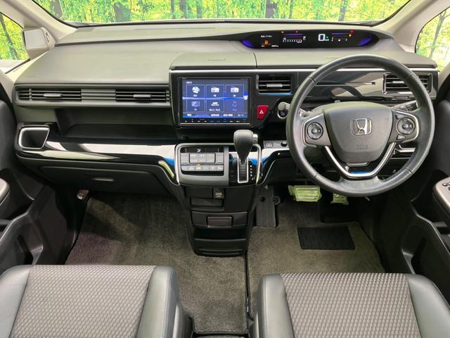 ステップワゴン モデューロＸ　両側電動スライドドア　純正ナビ　フリップダウン　バックカメラ　衝突軽減装置　レーダークルーズ　禁煙車　ハーフレザーシート　ドラレコ　レーンキープ　スマートキー　ＬＥＤヘッド　ＥＴＣ　オートライト（2枚目）