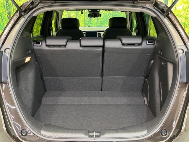 フィット ｅ：ＨＥＶリュクス　衝突軽減装置　禁煙車　９型ナビ　バックカメラ　ドラレコ　ＥＴＣ　レーダークルーズコントロール　クリアランスソナー　スマートキー　レーンアシスト　オートマチックハイビーム　オートエアコン（10枚目）