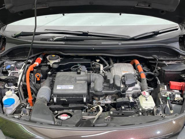 フィット ｅ：ＨＥＶリュクス　衝突軽減装置　禁煙車　９型ナビ　バックカメラ　ドラレコ　ＥＴＣ　レーダークルーズコントロール　クリアランスソナー　スマートキー　レーンアシスト　オートマチックハイビーム　オートエアコン（18枚目）