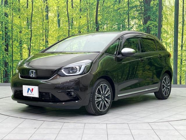 フィット ｅ：ＨＥＶリュクス　衝突軽減装置　禁煙車　９型ナビ　バックカメラ　ドラレコ　ＥＴＣ　レーダークルーズコントロール　クリアランスソナー　スマートキー　レーンアシスト　オートマチックハイビーム　オートエアコン（26枚目）