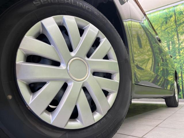 ウイングロード １５Ｍオーセンティック　純正ＳＤナビ　バックカメラ　禁煙車　ＥＴＣ　オートエアコン　オートライト　ＣＤ再生　地デジ　電動格納ミラー　キーレス（13枚目）