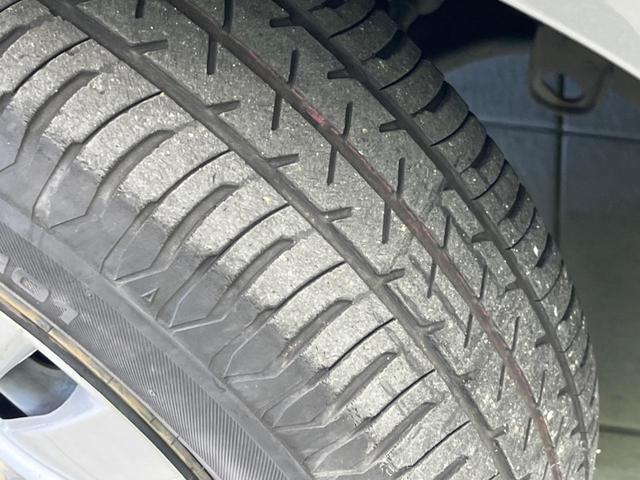 ウイングロード １５Ｍオーセンティック　純正ＳＤナビ　バックカメラ　禁煙車　ＥＴＣ　オートエアコン　オートライト　ＣＤ再生　地デジ　電動格納ミラー　キーレス（22枚目）