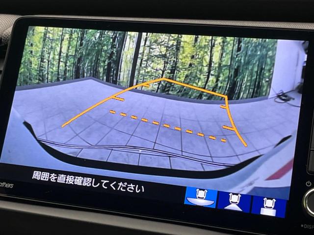 フィット ｅ：ＨＥＶクロスター　純正ナビ　バックカメラ　衝突軽減装置　レーダークルーズ　禁煙車　ドラレコ　コーナーセンサー　レーンキープ　スマートキー　ＬＥＤヘッド　ルーフレール　ＥＴＣ　オートマチックハイビーム　オートエアコン（4枚目）