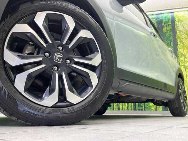 フィット ｅ：ＨＥＶクロスター　純正ナビ　バックカメラ　衝突軽減装置　レーダークルーズ　禁煙車　ドラレコ　コーナーセンサー　レーンキープ　スマートキー　ＬＥＤヘッド　ルーフレール　ＥＴＣ　オートマチックハイビーム　オートエアコン（13枚目）