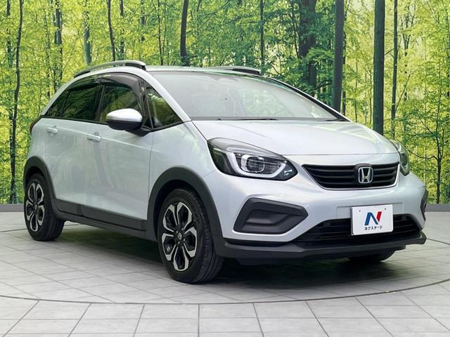 フィット ｅ：ＨＥＶクロスター　純正ナビ　バックカメラ　衝突軽減装置　レーダークルーズ　禁煙車　ドラレコ　コーナーセンサー　レーンキープ　スマートキー　ＬＥＤヘッド　ルーフレール　ＥＴＣ　オートマチックハイビーム　オートエアコン（16枚目）