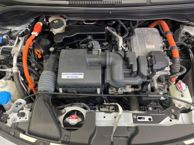 フィット ｅ：ＨＥＶクロスター　純正ナビ　バックカメラ　衝突軽減装置　レーダークルーズ　禁煙車　ドラレコ　コーナーセンサー　レーンキープ　スマートキー　ＬＥＤヘッド　ルーフレール　ＥＴＣ　オートマチックハイビーム　オートエアコン（18枚目）