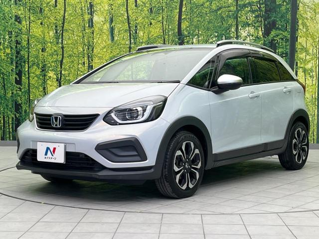 フィット ｅ：ＨＥＶクロスター　純正ナビ　バックカメラ　衝突軽減装置　レーダークルーズ　禁煙車　ドラレコ　コーナーセンサー　レーンキープ　スマートキー　ＬＥＤヘッド　ルーフレール　ＥＴＣ　オートマチックハイビーム　オートエアコン（25枚目）