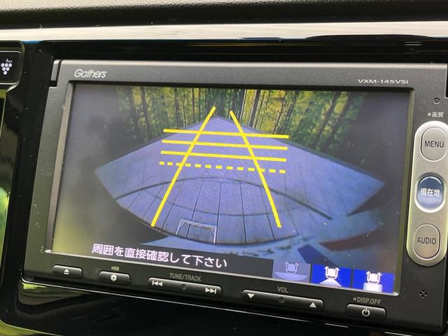 N-WGNカスタム G・ターボパッケージ 純正ナビ 禁煙車 バックカメラ 衝突被害軽減 ハーフレザーシート ETC ドラレコ スマートキー HIDヘッド クルコン 純正14インチアルミ オートライト オートエアコン(5枚目)