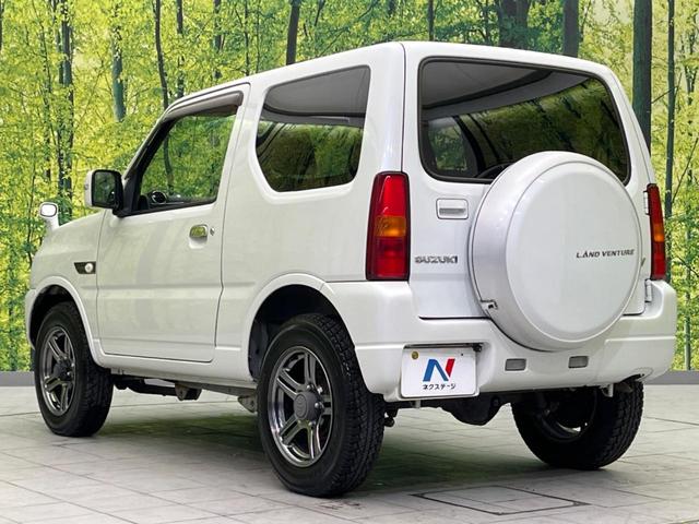 ジムニー ランドベンチャー 4WD SDナビ バックカメラ 禁煙車 ハーフレザーシート シートヒーター ETC 純正16インチAW Bluetooth再生 CD/DVD再生 フルセグ 革巻きステアリング フォグライト(28枚目)