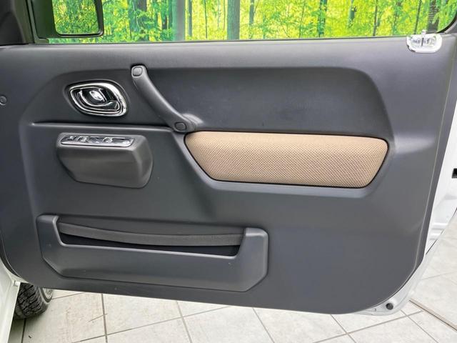 ジムニー ランドベンチャー 4WD SDナビ バックカメラ 禁煙車 ハーフレザーシート シートヒーター ETC 純正16インチAW Bluetooth再生 CD/DVD再生 フルセグ 革巻きステアリング フォグライト(33枚目)