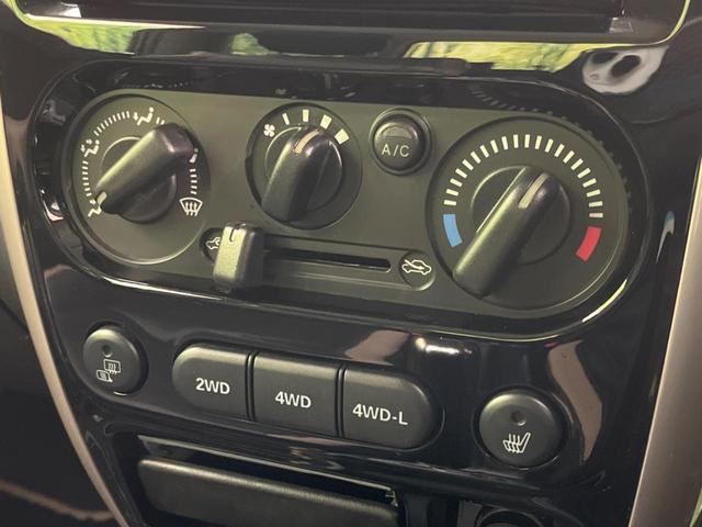 ジムニー ランドベンチャー 4WD SDナビ バックカメラ 禁煙車 ハーフレザーシート シートヒーター ETC 純正16インチAW Bluetooth再生 CD/DVD再生 フルセグ 革巻きステアリング フォグライト(46枚目)