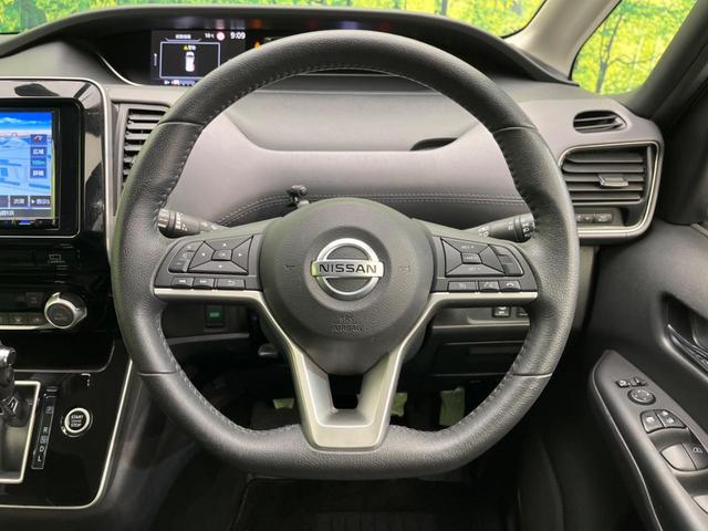 セレナ ハイウェイスターＶ　両側電動スライドドア　ＳＤナビ　後席モニター　全周囲カメラ　衝突軽減装置　禁煙車　ドラレコ　コーナーセンサー　レーンキープ　スマートキー　ＬＥＤヘッド　ＥＴＣ　クルーズコントロール　オートライト（12枚目）