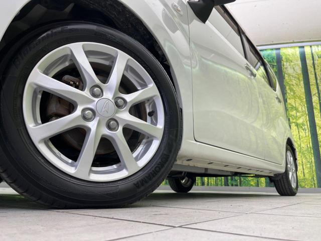 ムーヴ Ｘ　ＳＡＩＩ　衝突軽減装置　純正ナビ　バックカメラ　禁煙車　ＥＴＣ　スマートキー　オートライト　純正１４インチＡＷ　車線逸脱警報　ドアバイザー　電動格納ミラー　盗難防止システム　プライバシーガラス（13枚目）