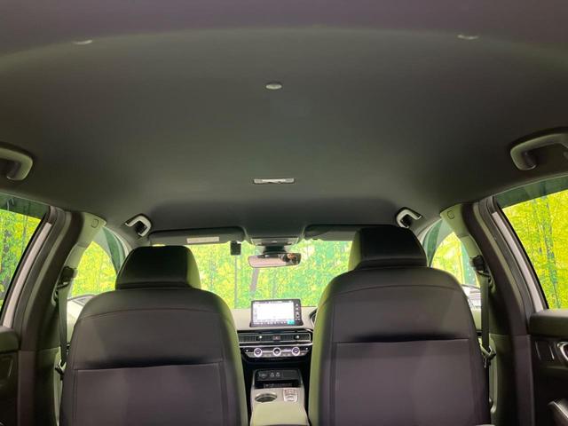 シビック ｅ：ＨＥＶ　純正９型ナビ　バックカメラ　ＢＯＳＥサウンドシステム　衝突軽減装置　レーダークルーズ　禁煙車　ハーフレザーシート　シートヒーター　パワーシート　ドラレコ　コーナーセンサー　レーンキープ　スマートキー（33枚目）