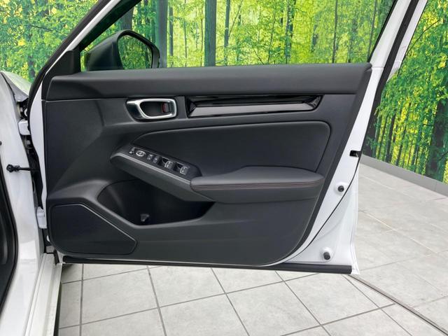 シビック ｅ：ＨＥＶ　純正９型ナビ　バックカメラ　ＢＯＳＥサウンドシステム　衝突軽減装置　レーダークルーズ　禁煙車　ハーフレザーシート　シートヒーター　パワーシート　ドラレコ　コーナーセンサー　レーンキープ　スマートキー（35枚目）