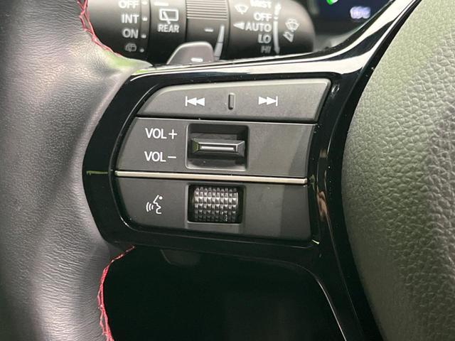 シビック ｅ：ＨＥＶ　純正９型ナビ　バックカメラ　ＢＯＳＥサウンドシステム　衝突軽減装置　レーダークルーズ　禁煙車　ハーフレザーシート　シートヒーター　パワーシート　ドラレコ　コーナーセンサー　レーンキープ　スマートキー（50枚目）