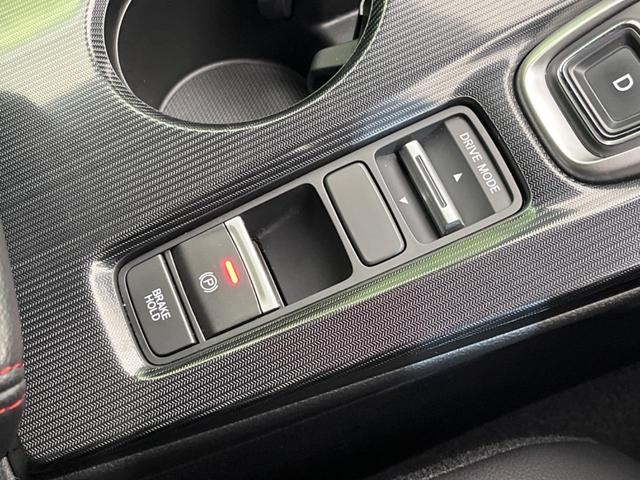 シビック ｅ：ＨＥＶ　純正９型ナビ　バックカメラ　ＢＯＳＥサウンドシステム　衝突軽減装置　レーダークルーズ　禁煙車　ハーフレザーシート　シートヒーター　パワーシート　ドラレコ　コーナーセンサー　レーンキープ　スマートキー（58枚目）